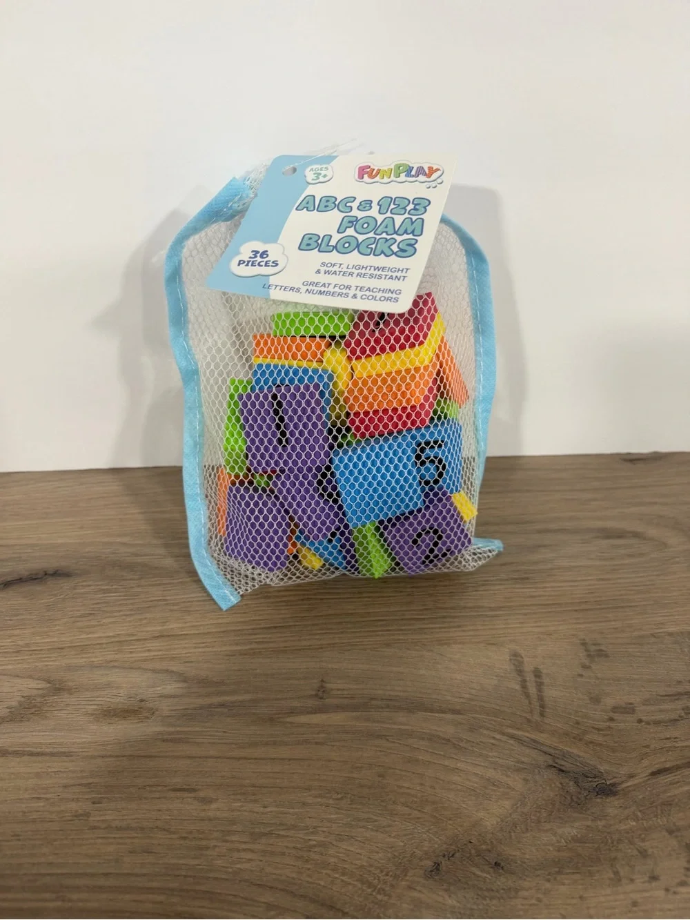 Foam Blocks in a Blue Mesh Bag. ABC & 123 Foam Blocks - Multicolor Learning Set